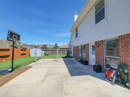 a house view with a backyard space