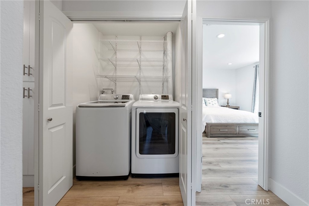 22287 Modina Laguna Hills, CA 92653 - Photo 18 of 25 a utility room with washer and dryer