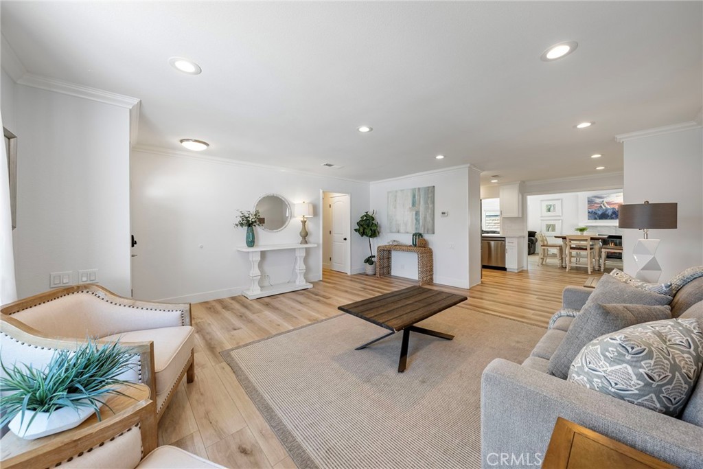 22287 Modina Laguna Hills, CA 92653 - Photo 6 of 25 a living room with furniture and a table