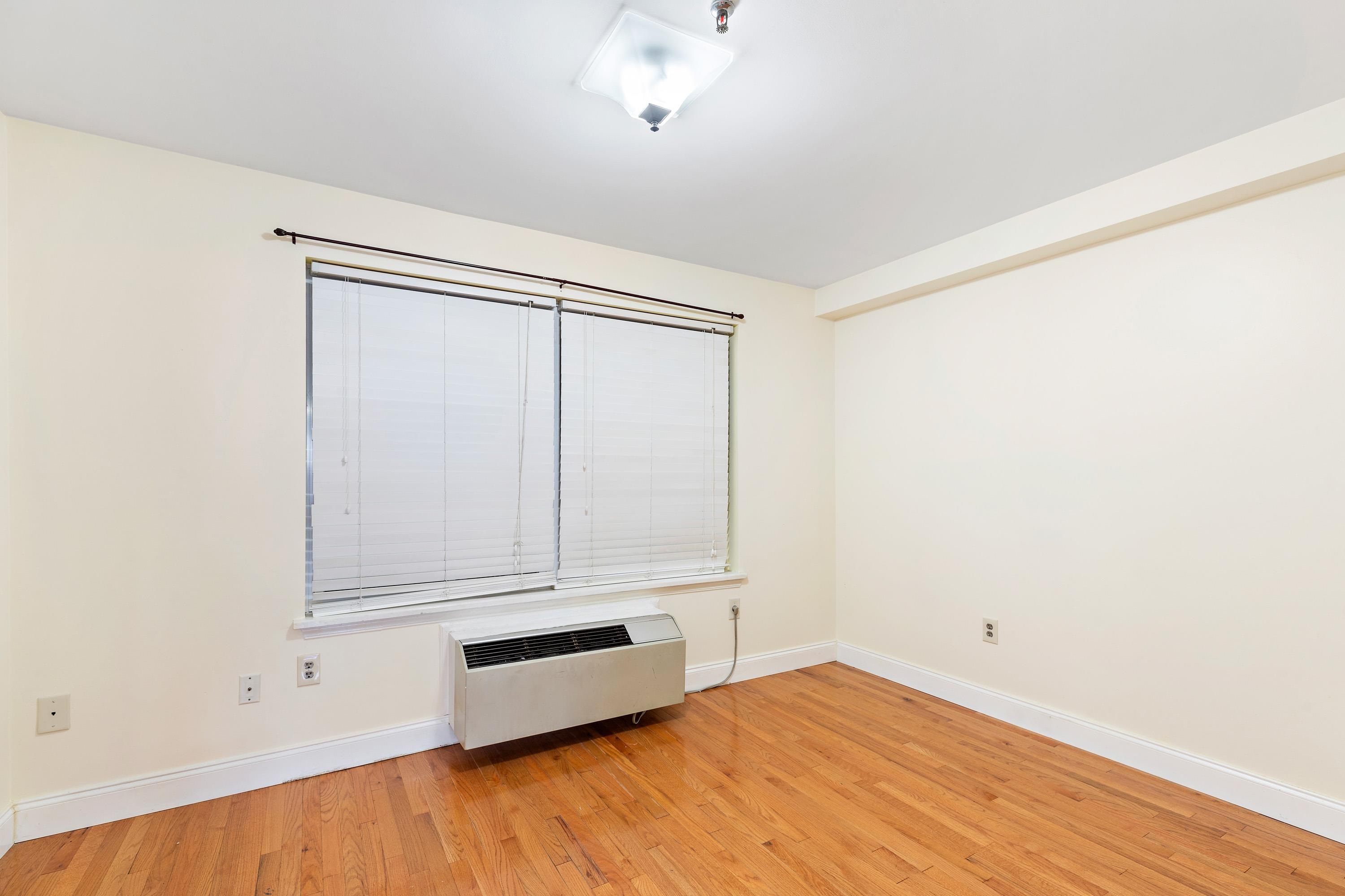56 Ferguson Street, Unit C2 Newark, NJ 07105 - Photo 11 of 16 a view of room with hardwood floor
