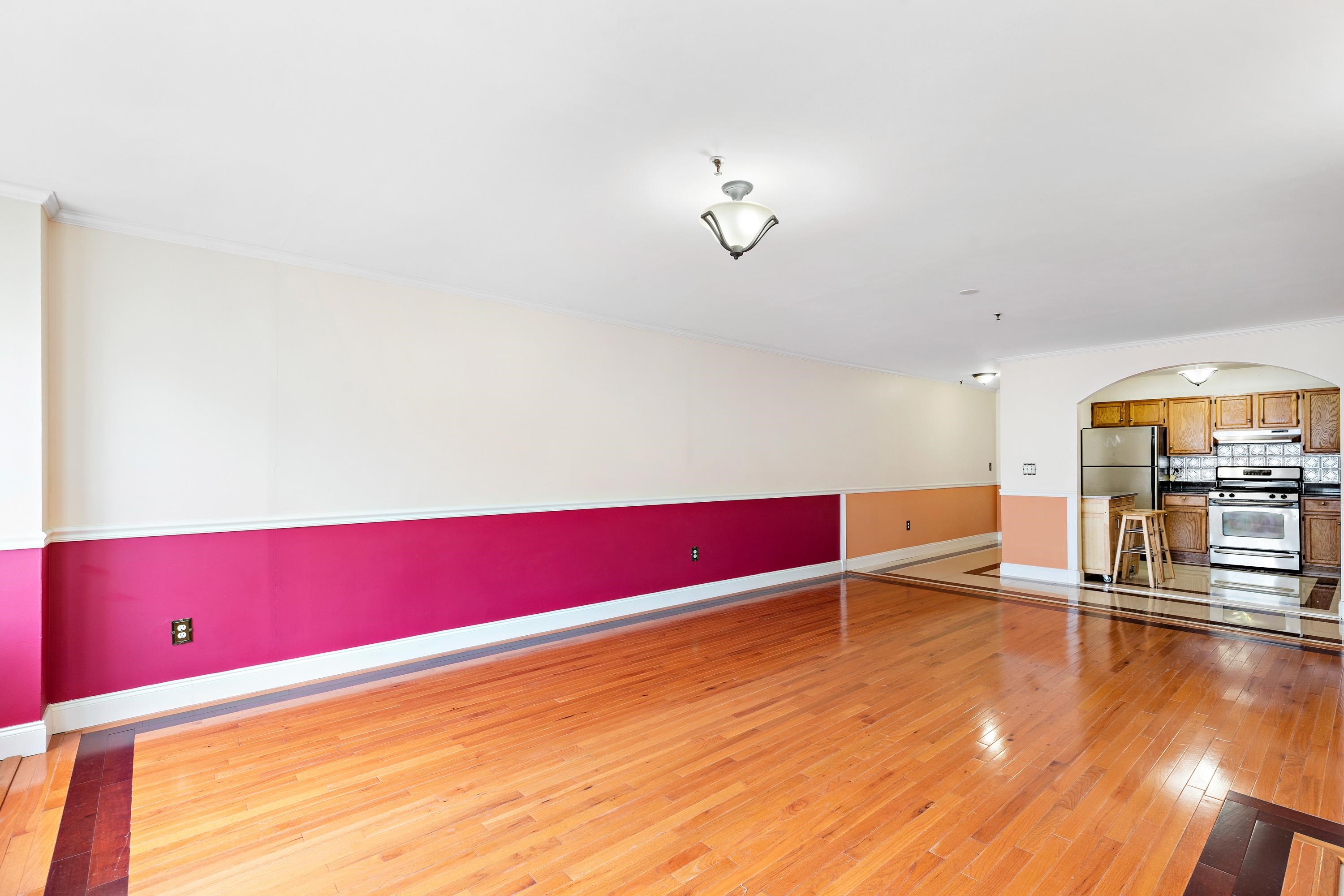 56 Ferguson Street, Unit C2 Newark, NJ 07105 - Photo 3 of 16 a view of a room with wooden floor
