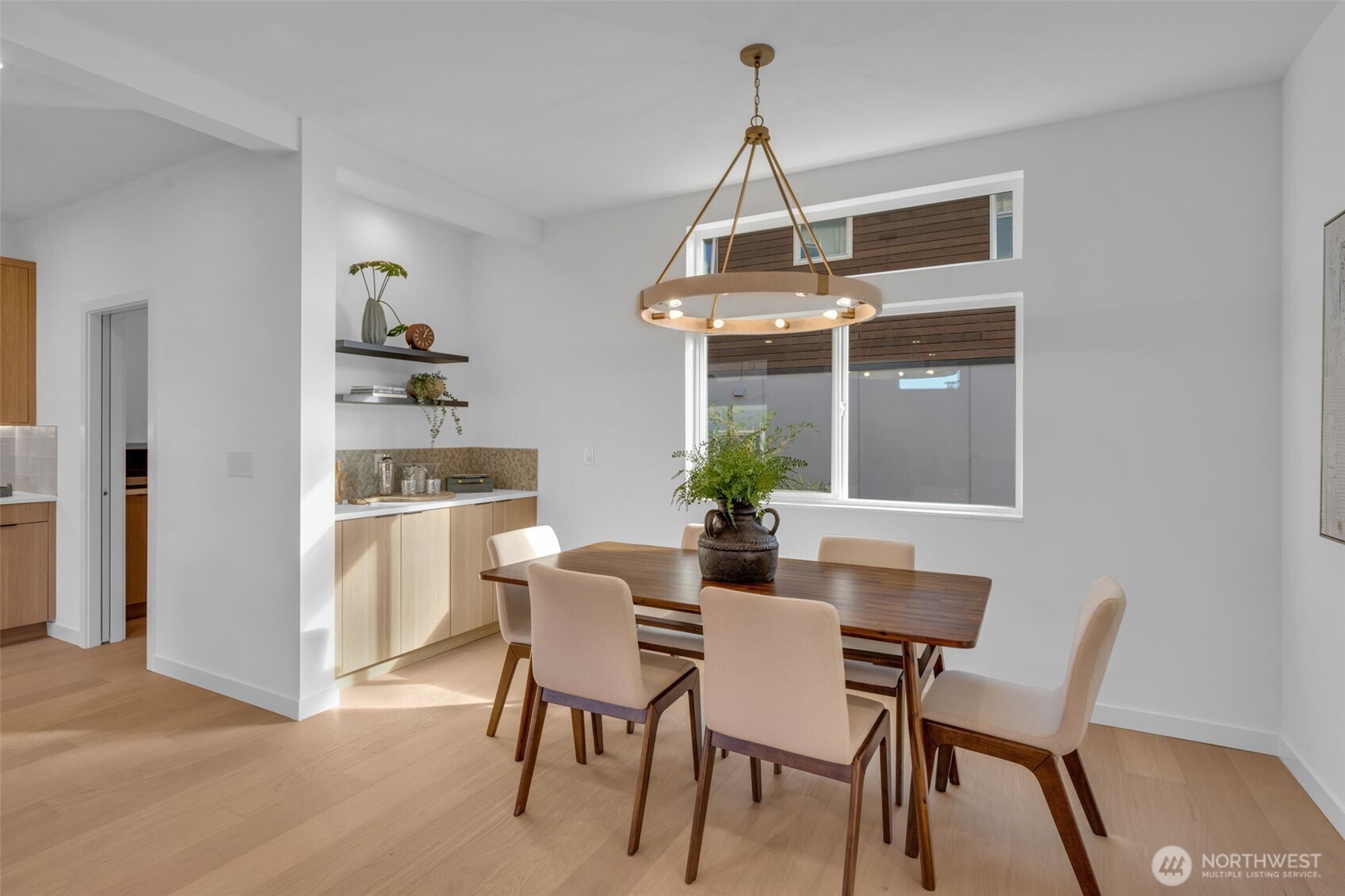 5642 49th Avenue Southwest Seattle, WA 98136 - Photo 15 of 39 a view of a dining room with furniture and window