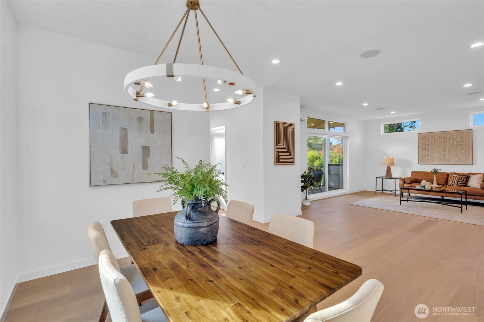 5642 49th Avenue Southwest Seattle, WA 98136 - Photo 17 of 39 a view of a livingroom with furniture and a potted plant