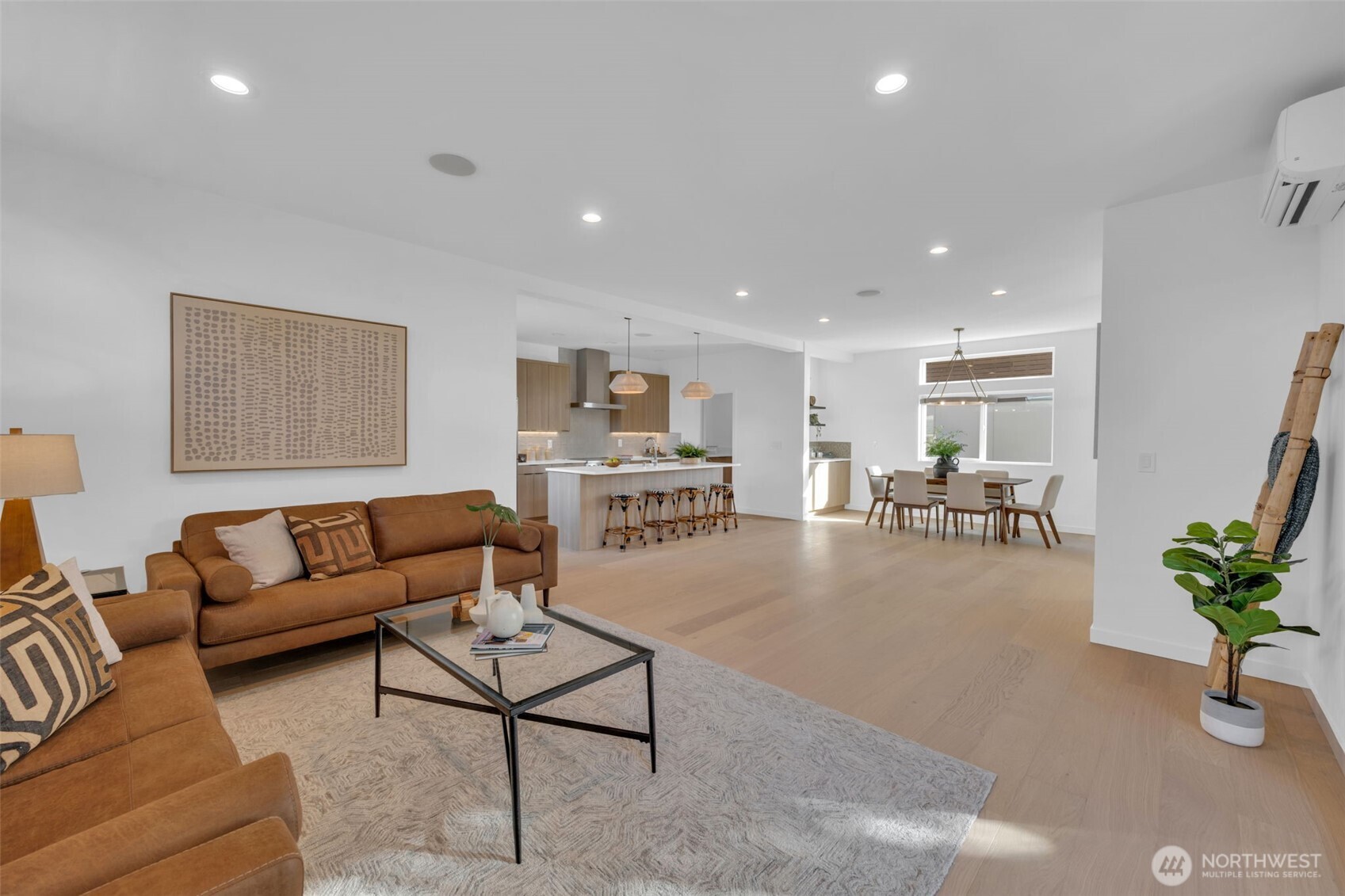 5642 49th Avenue Southwest Seattle, WA 98136 - Photo 18 of 39 a living room with furniture and a potted plant