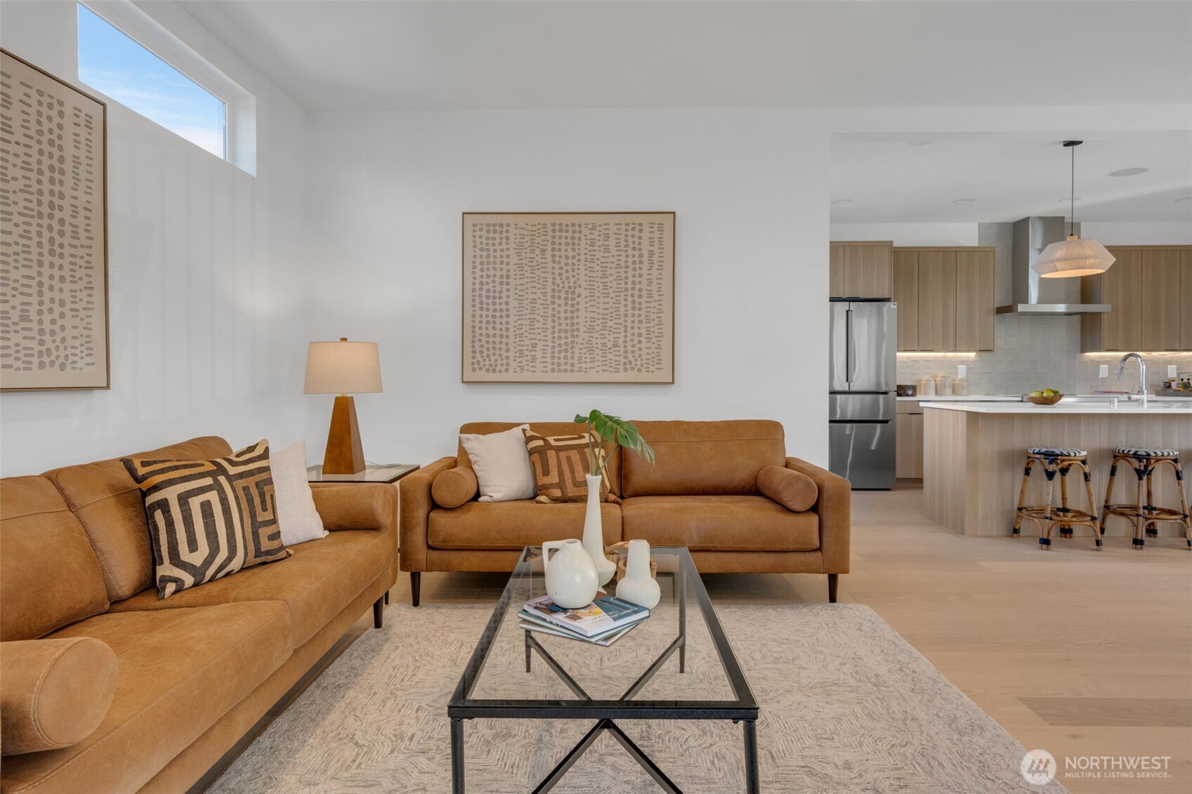 5642 49th Avenue Southwest Seattle, WA 98136 - Photo 19 of 39 a living room with furniture and a table
