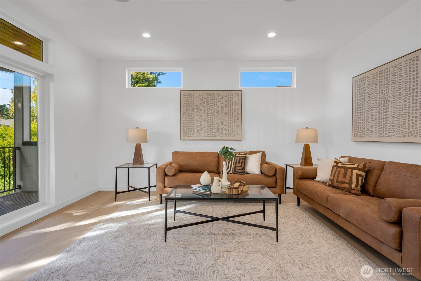 5642 49th Avenue Southwest Seattle, WA 98136 - Photo 20 of 39 a living room with furniture and a potted plant on table