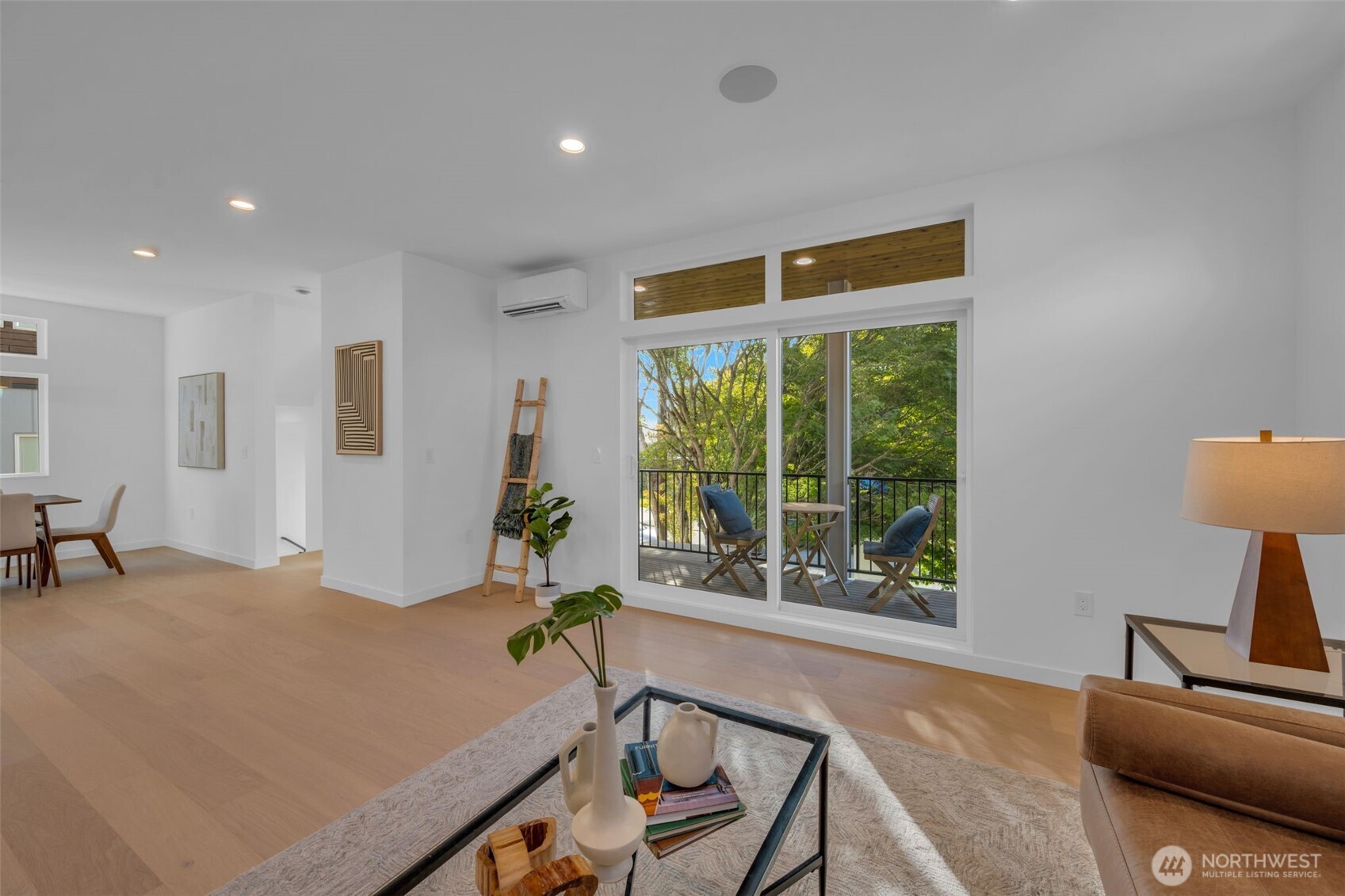 5642 49th Avenue Southwest Seattle, WA 98136 - Photo 22 of 39 a bed room with furniture and a window