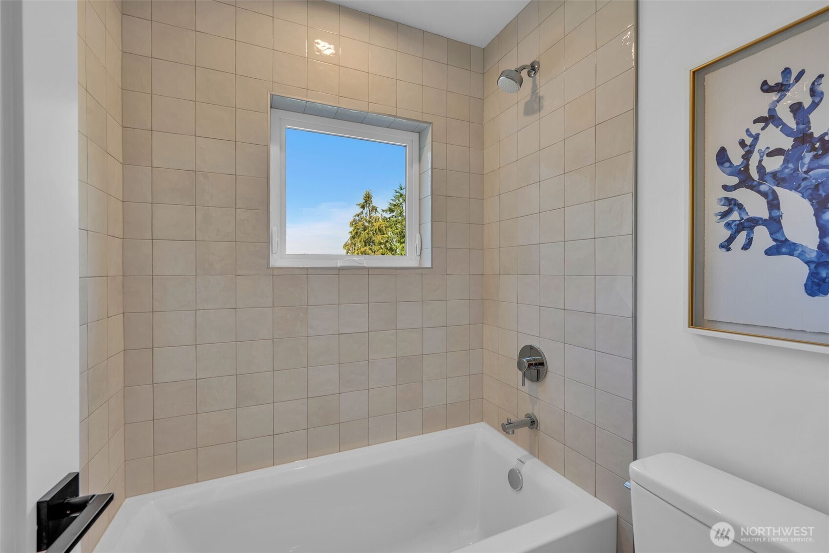 5642 49th Avenue Southwest Seattle, WA 98136 - Photo 26 of 39 a bathroom with a bathtub and shower