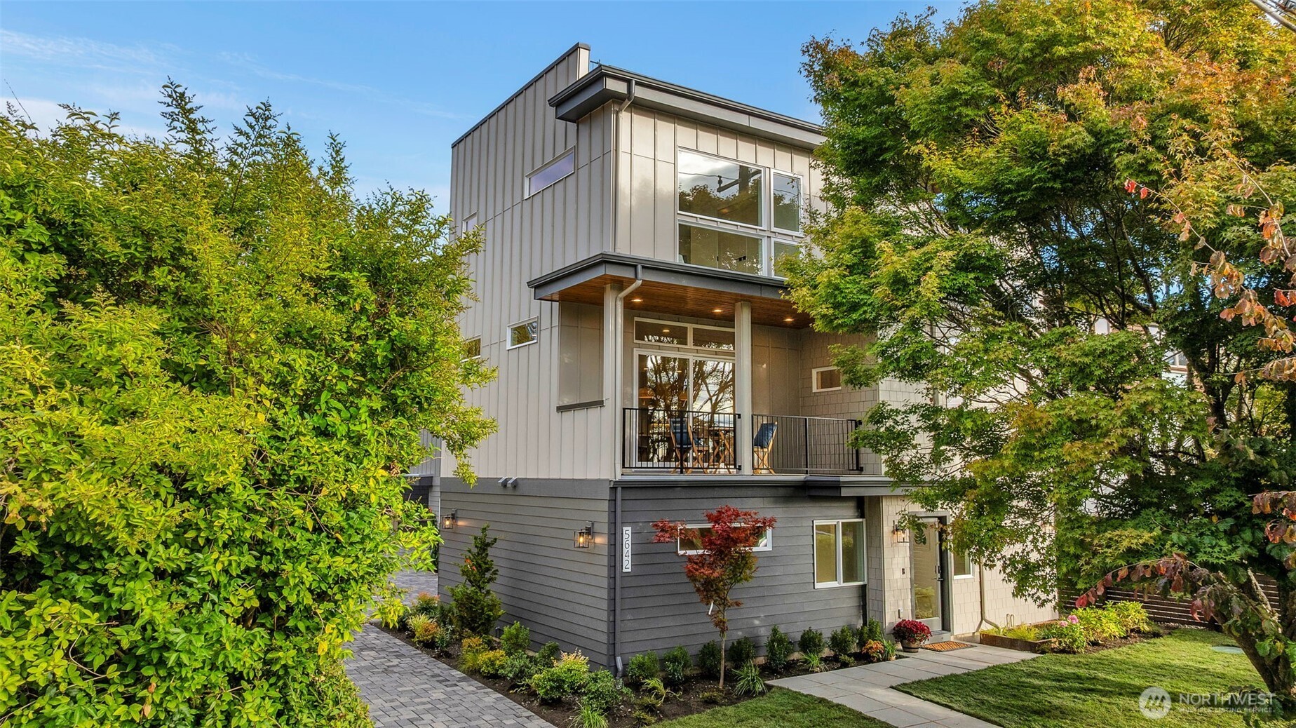 5642 49th Avenue Southwest Seattle, WA 98136 - Photo 3 of 39 front view of a house with a small yard