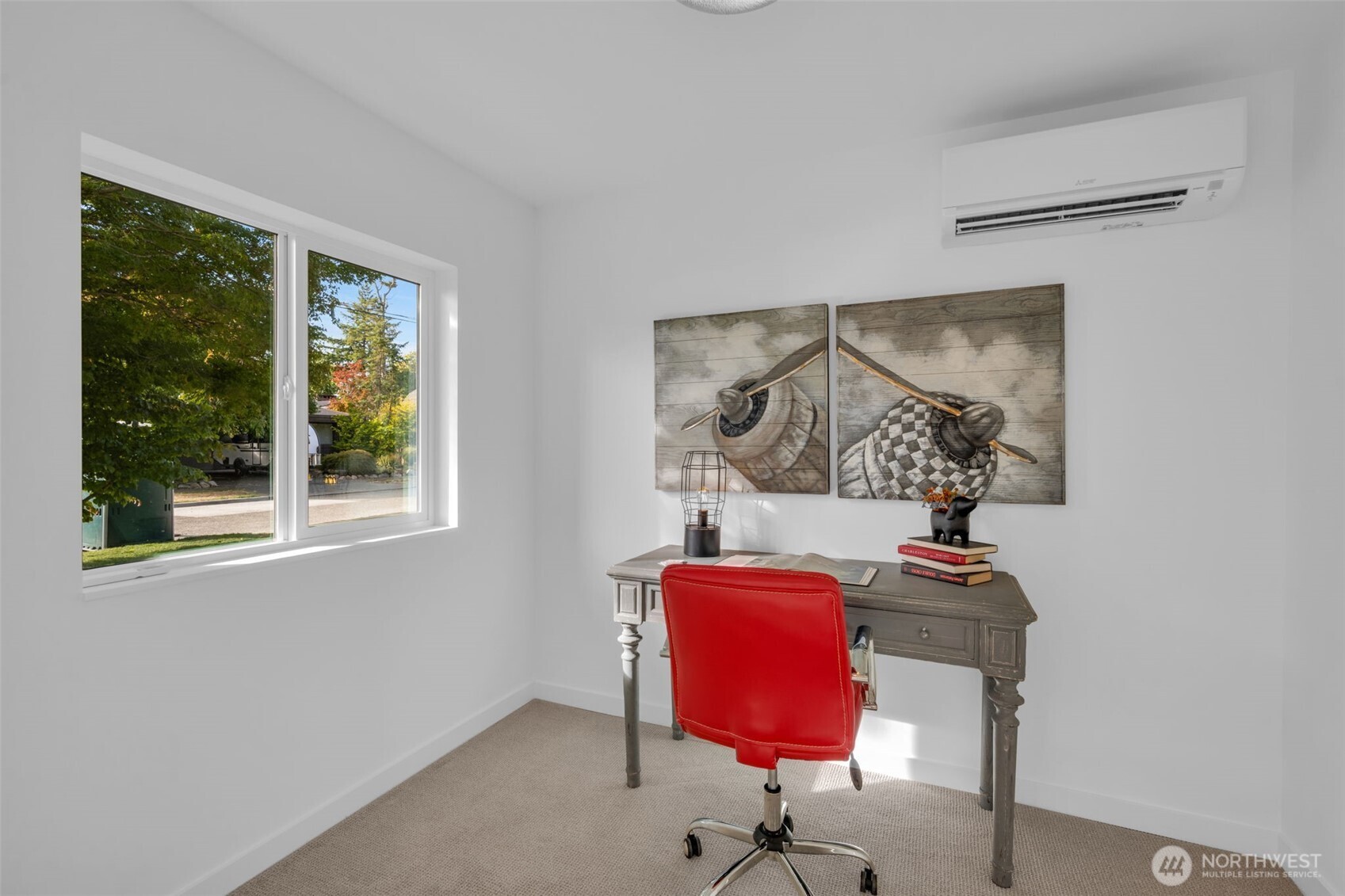 5642 49th Avenue Southwest Seattle, WA 98136 - Photo 33 of 39 a view of a workspace with furniture and a window