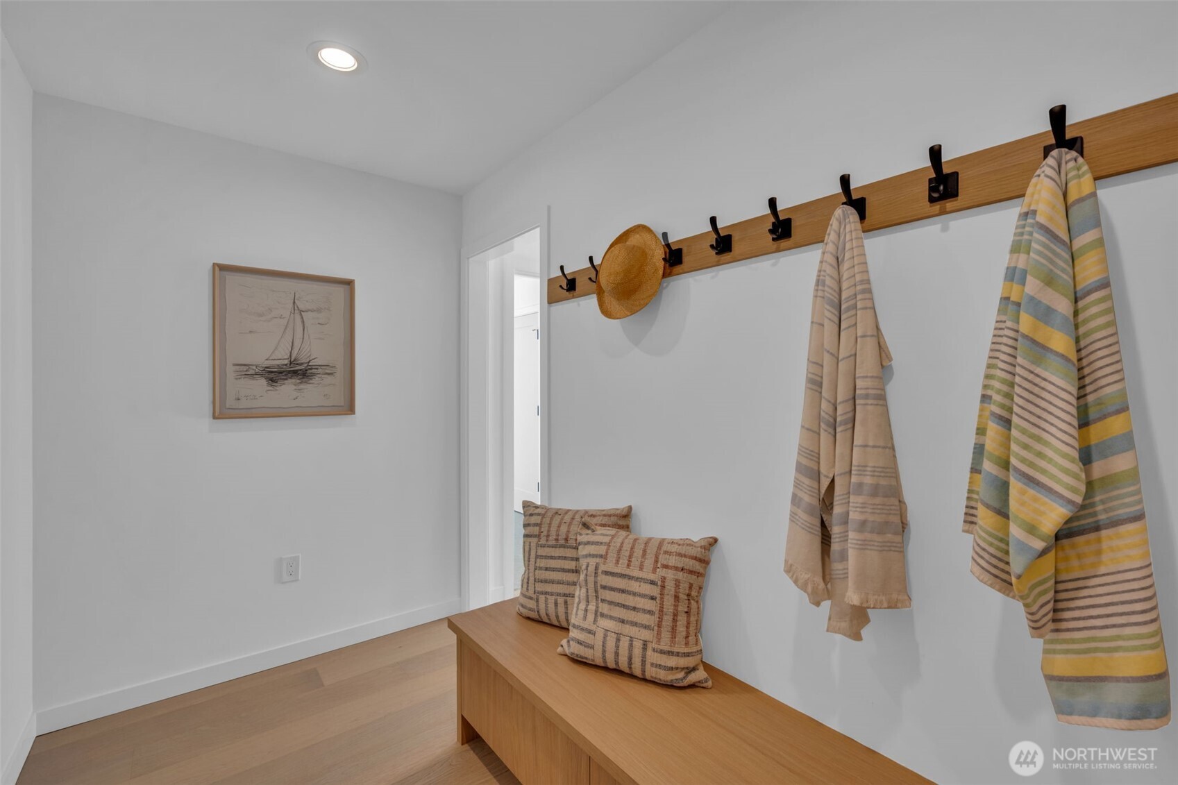 5642 49th Avenue Southwest Seattle, WA 98136 - Photo 5 of 39 a view of walk in closet with clothes and shoes