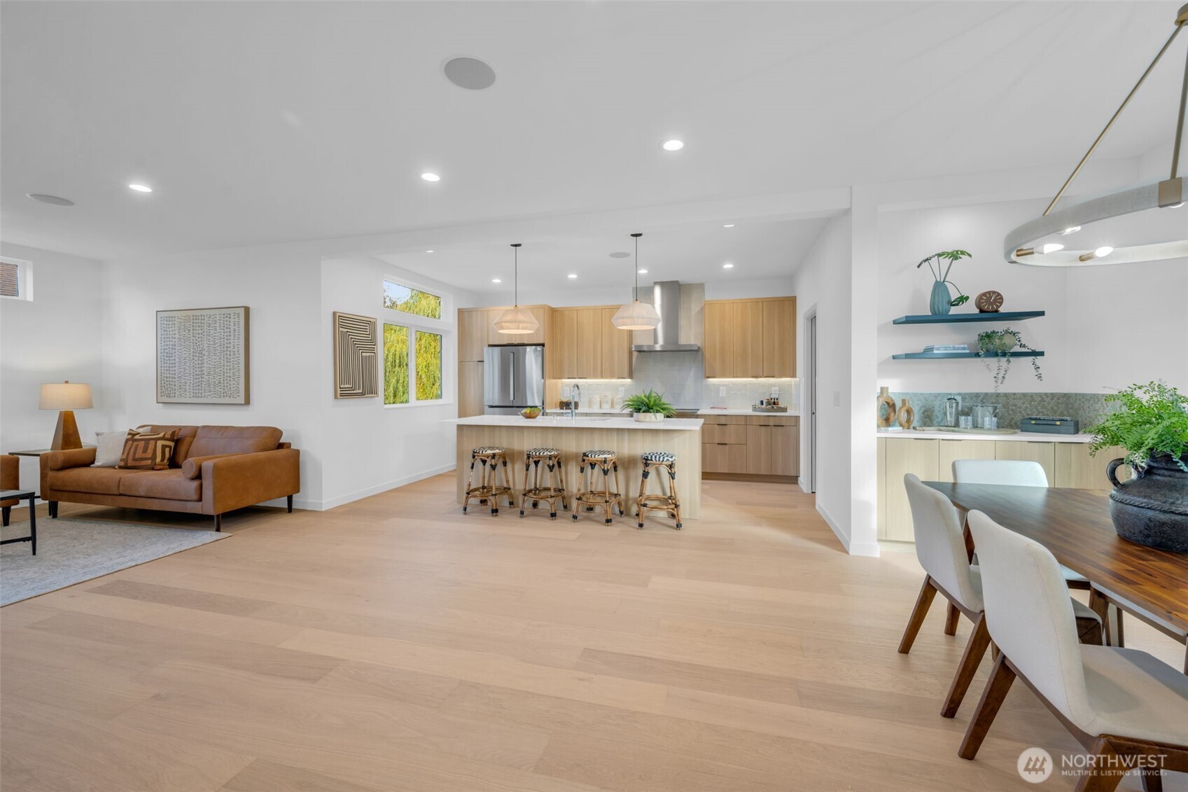 5642 49th Avenue Southwest Seattle, WA 98136 - Photo 6 of 39 a view of kitchen with furniture and a refrigerator