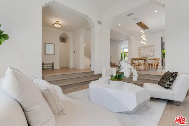 a living room with furniture and a couch