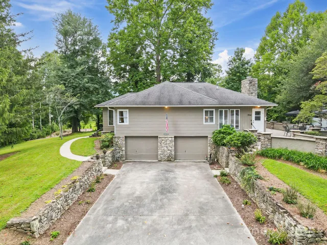 a house view with a garden space