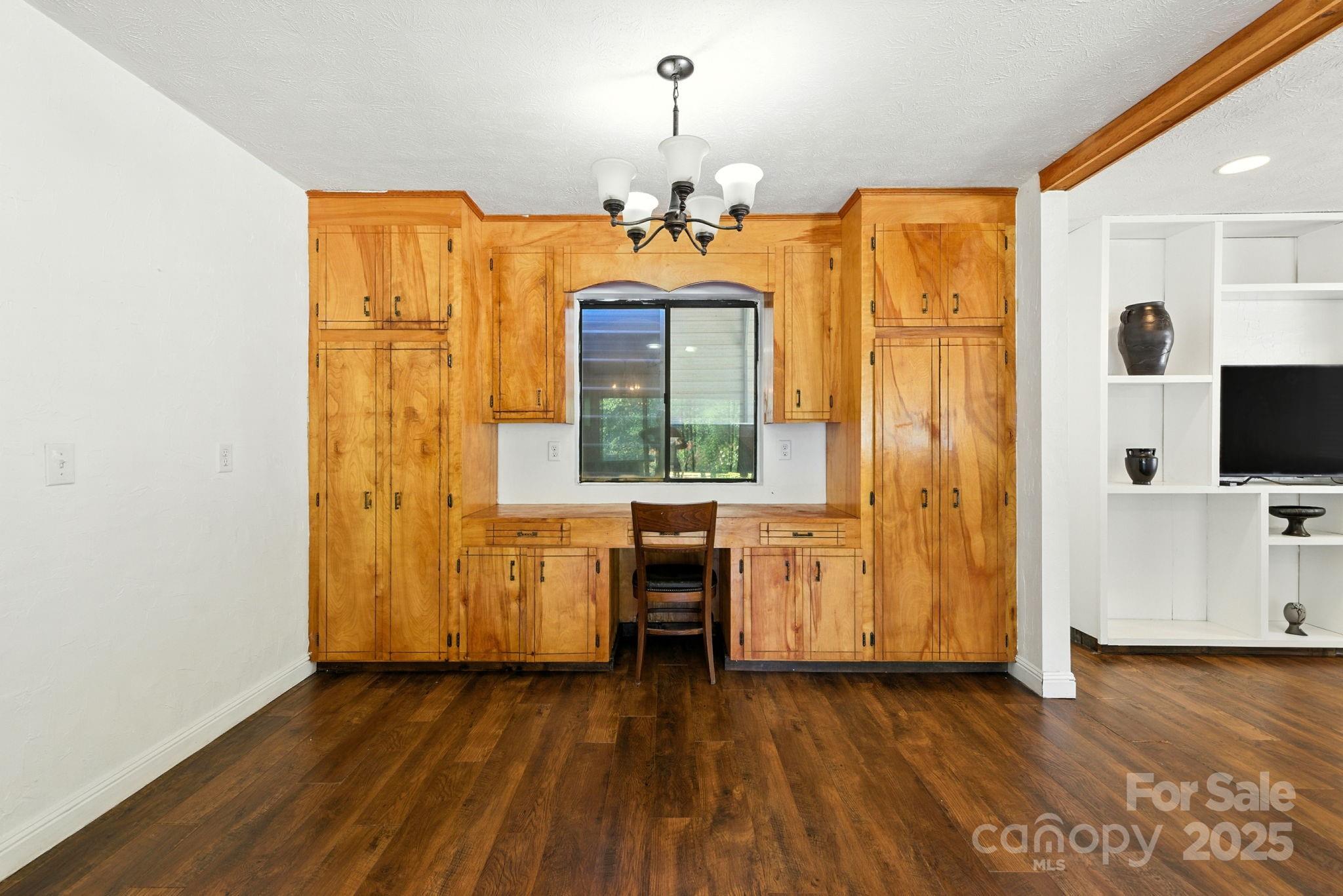 7741 Brevard Road Etowah, NC 28729 - Photo 43 of 48 a view of a windows and chandelier in a room
