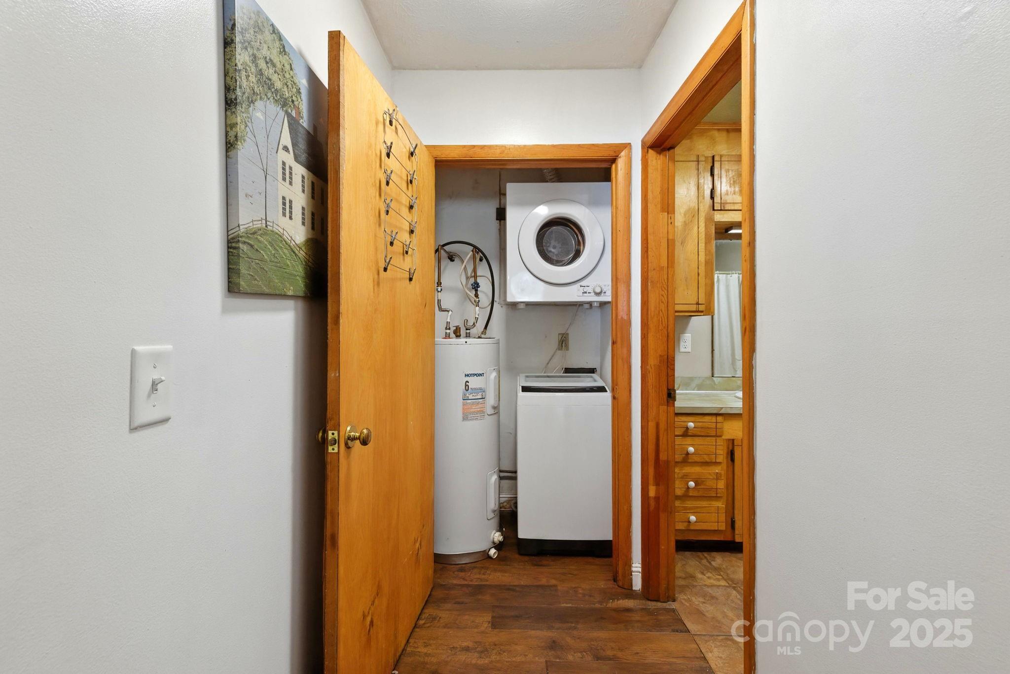 7741 Brevard Road Etowah, NC 28729 - Photo 48 of 48 a view of a hallway with storage and utility room