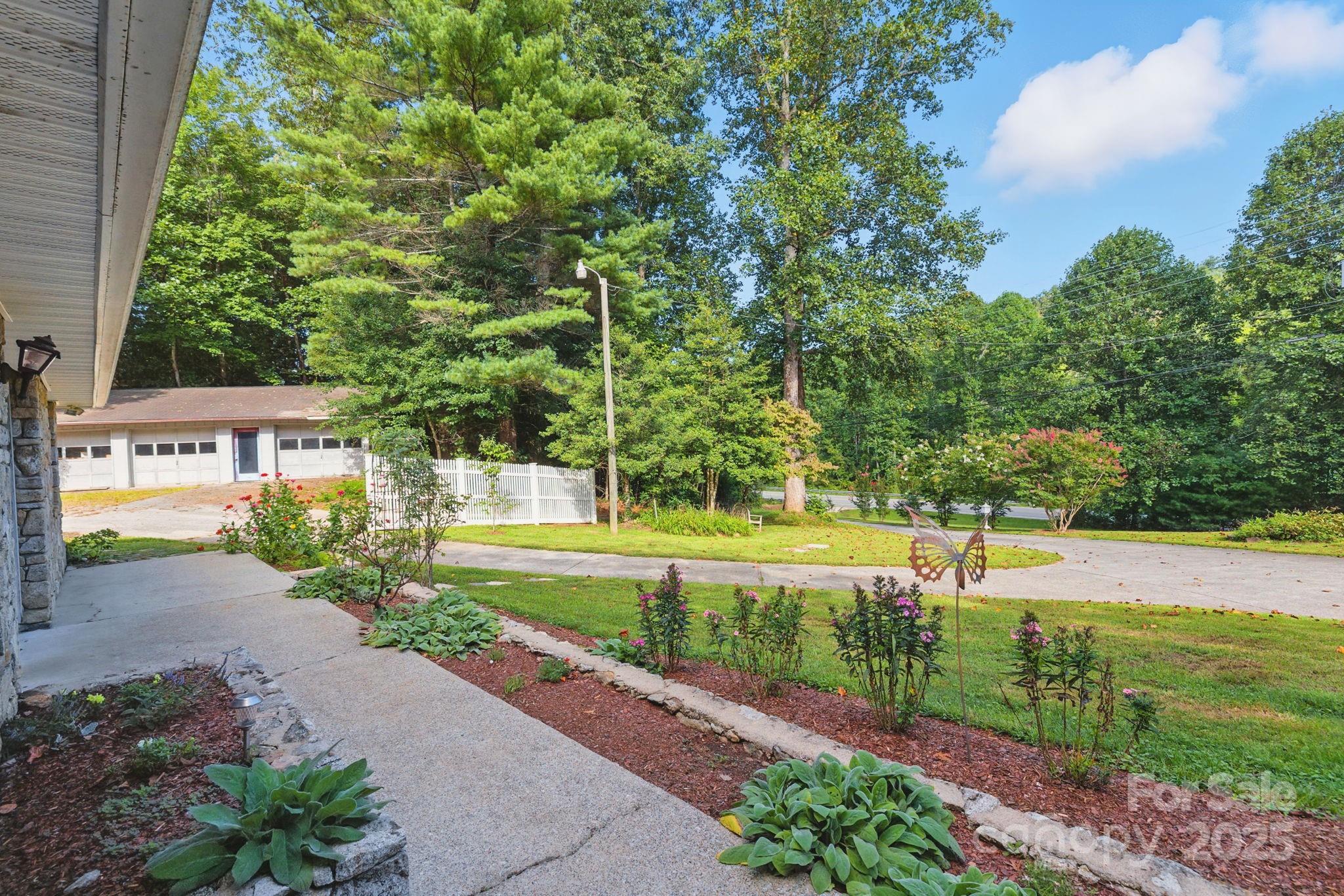 7741 Brevard Road Etowah, NC 28729 - Photo 8 of 48 a view of a park with large trees