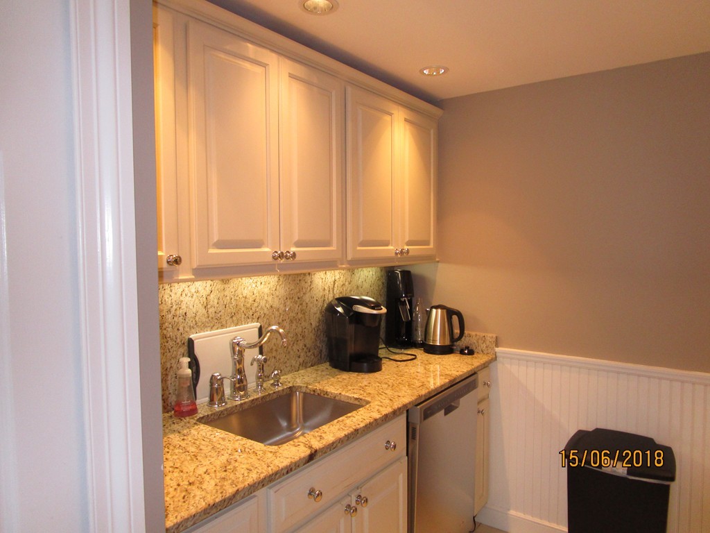 390 Commonwealth Avenue, Unit 210 Boston, MA 02215 - Photo 11 of 30 a kitchen with a sink and cabinets