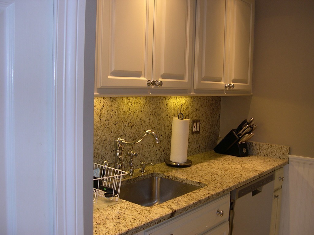 390 Commonwealth Avenue, Unit 210 Boston, MA 02215 - Photo 14 of 30 a kitchen with a sink and cabinets