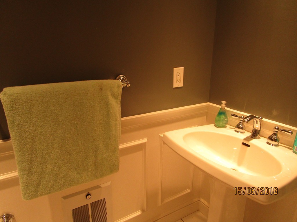 390 Commonwealth Avenue, Unit 210 Boston, MA 02215 - Photo 19 of 30 a bathroom with a sink and a mirror