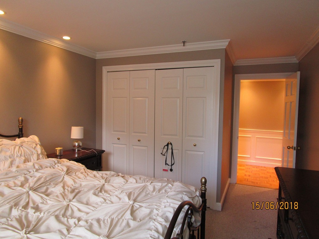 390 Commonwealth Avenue, Unit 210 Boston, MA 02215 - Photo 24 of 30 a bedroom with a bed and a window