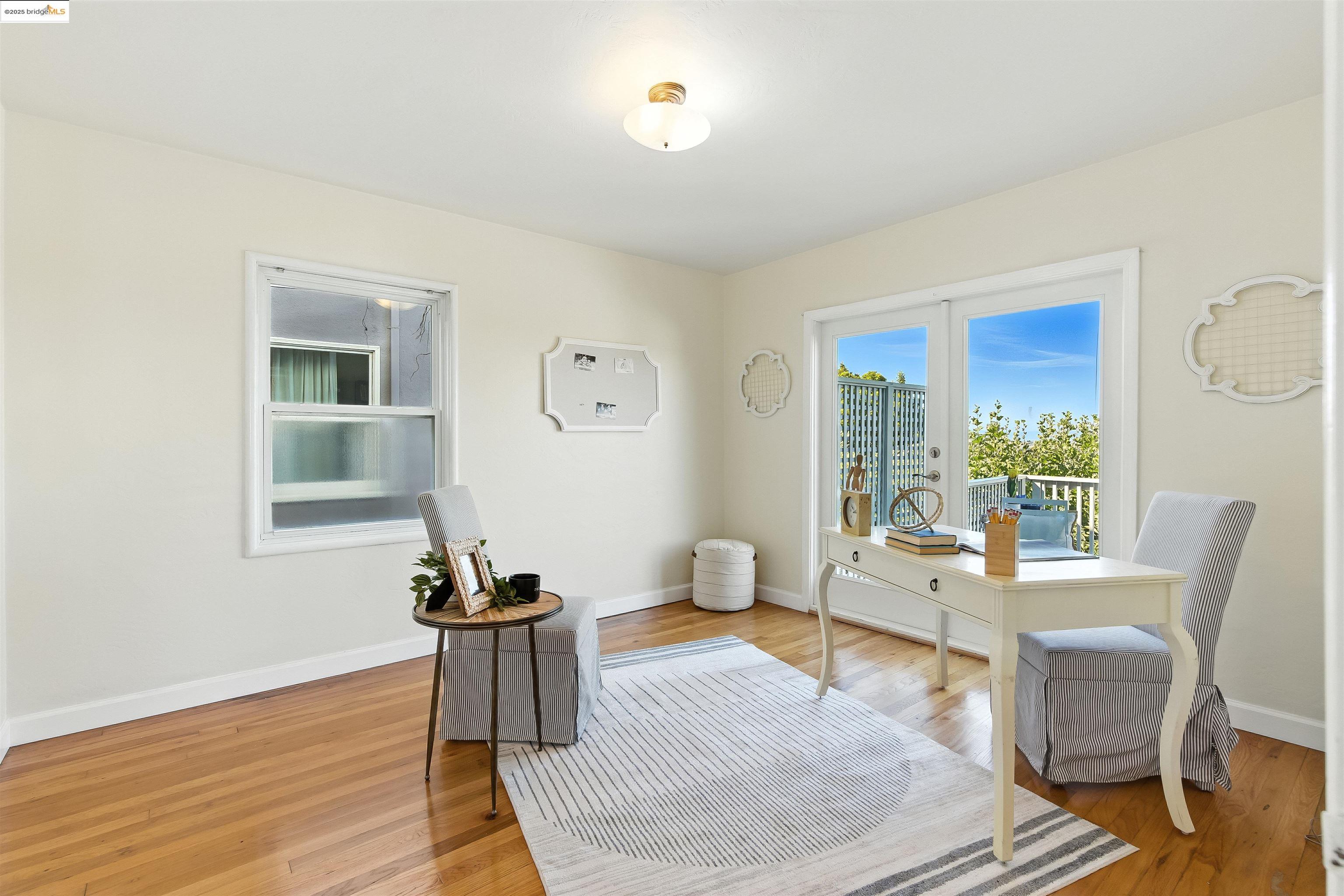 6623 Outlook Avenue Oakland, CA 94605 - Photo 15 of 38 Sitting room with light wood finished floors and a desk