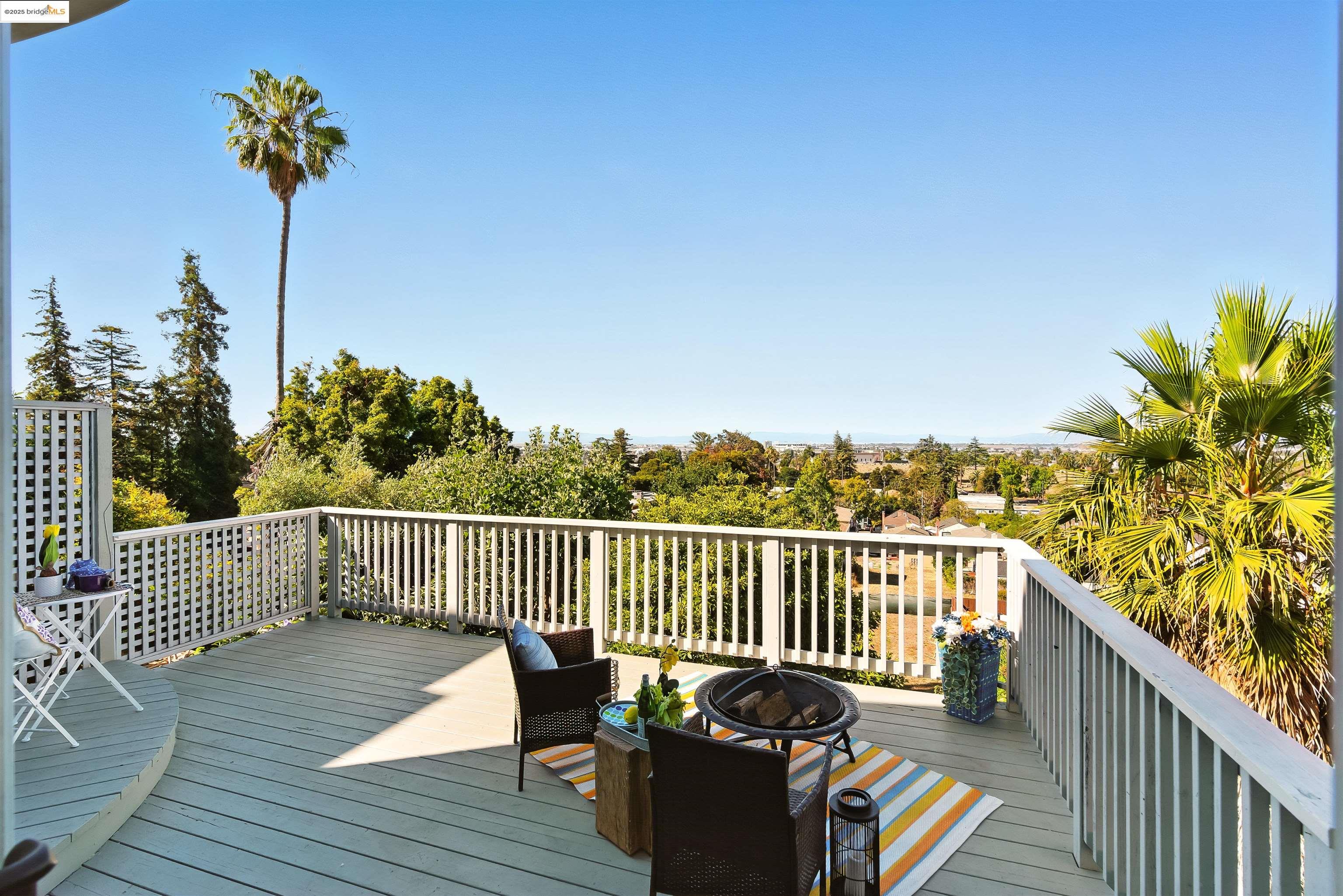 6623 Outlook Avenue Oakland, CA 94605 - Photo 25 of 38 Deck with an outdoor fire pit