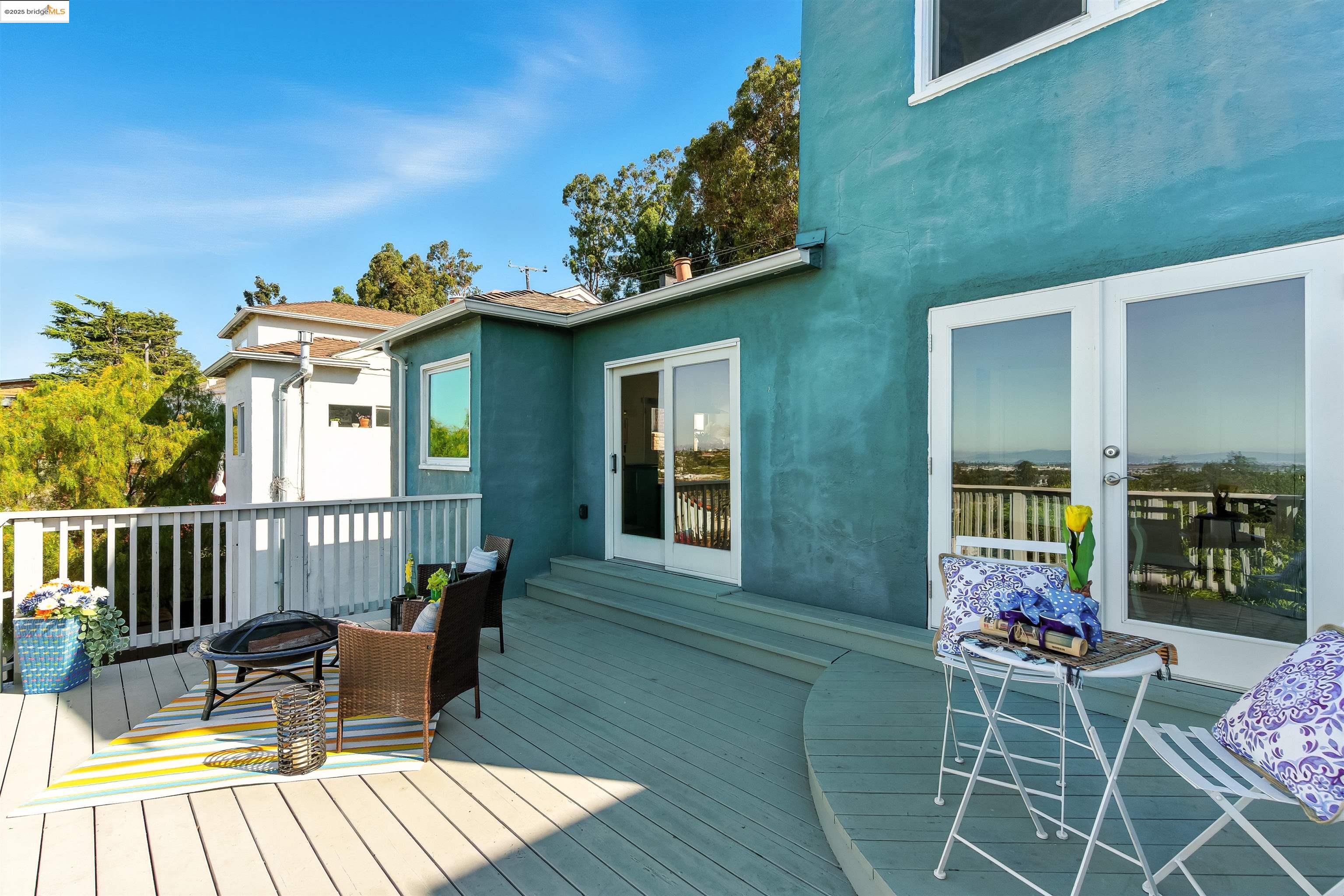 6623 Outlook Avenue Oakland, CA 94605 - Photo 26 of 38 Wooden deck featuring a fire pit