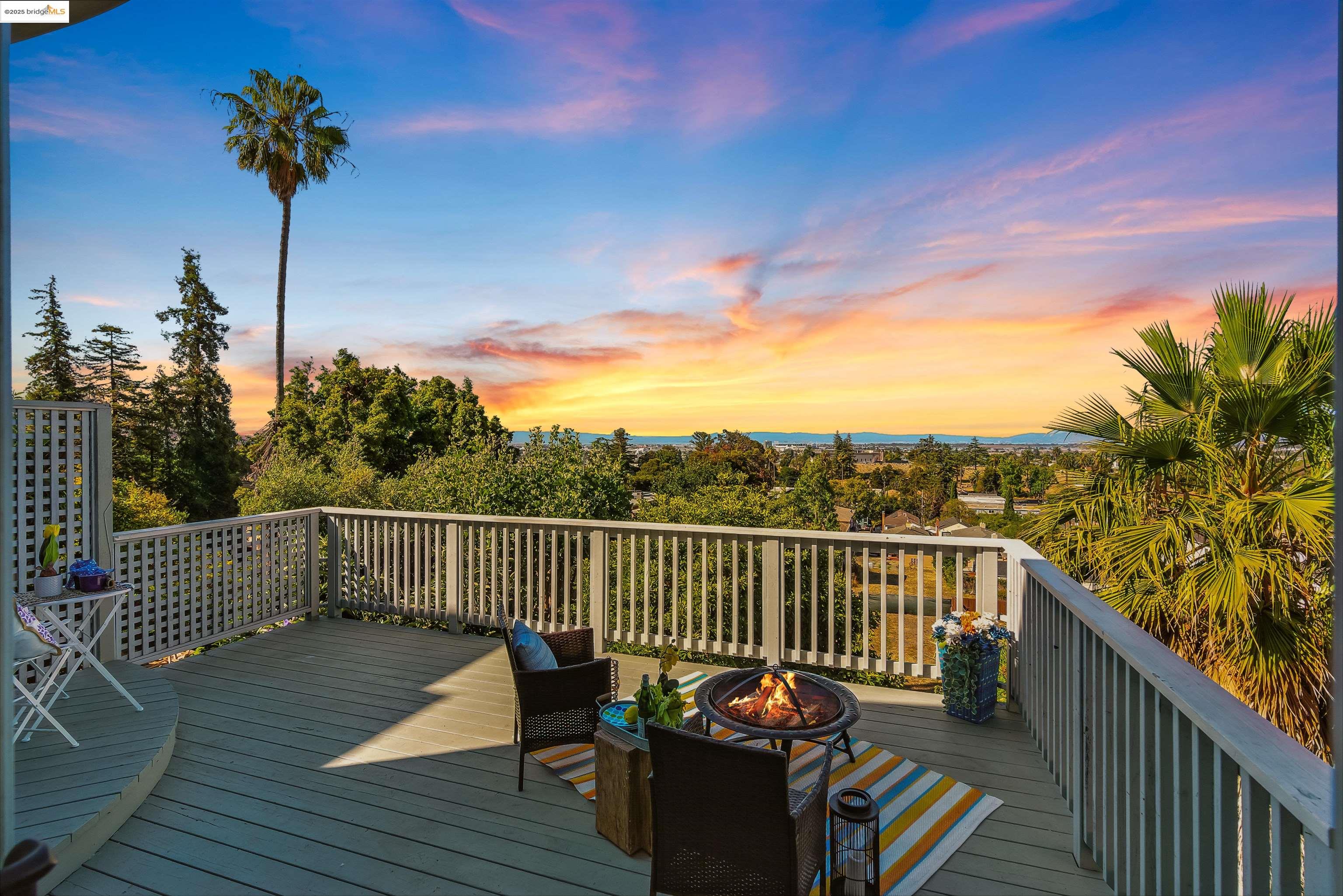 6623 Outlook Avenue Oakland, CA 94605 - Photo 35 of 38 Deck at dusk with a fire pit