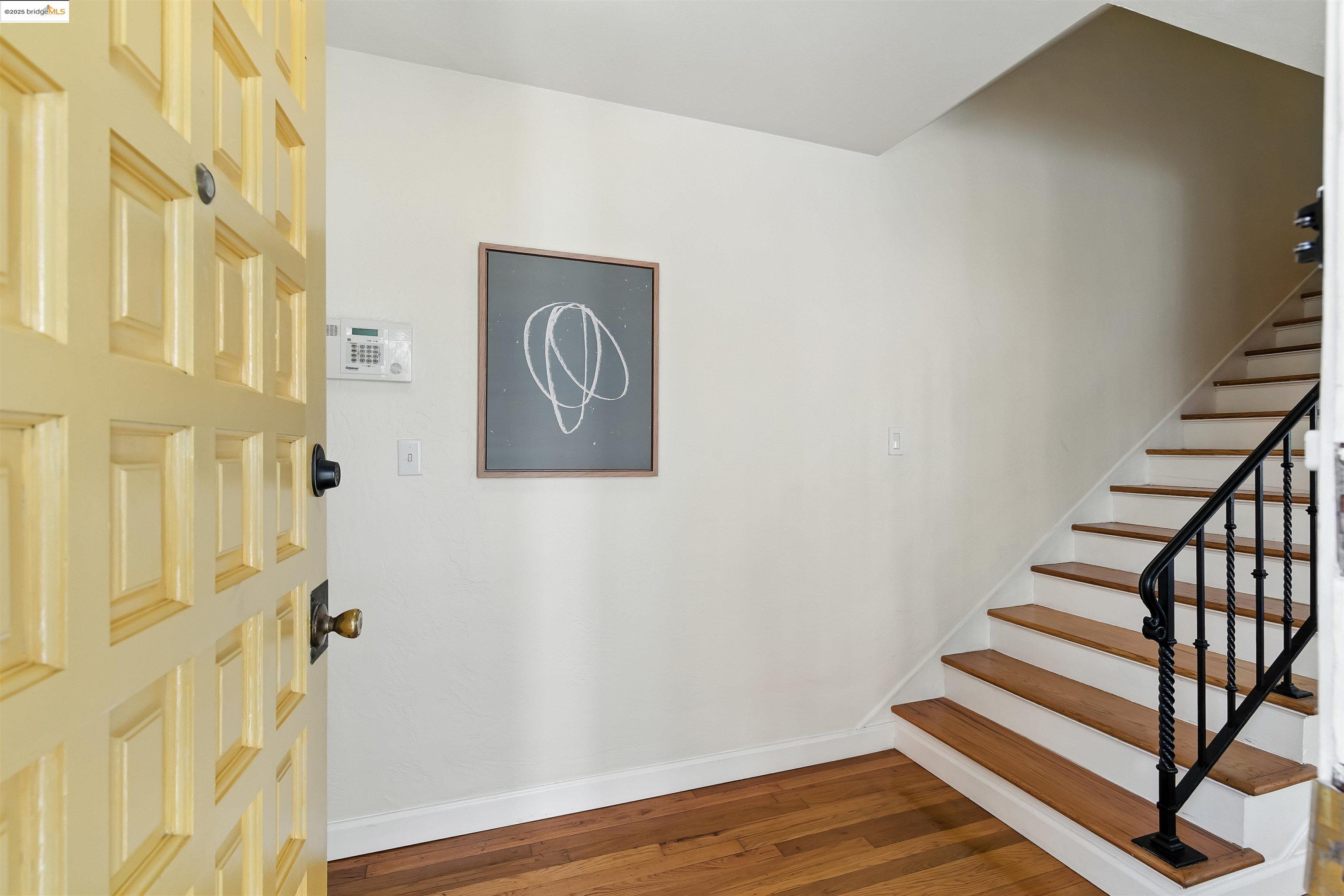 6623 Outlook Avenue Oakland, CA 94605 - Photo 5 of 38 Stairs featuring wood finished floors and baseboards