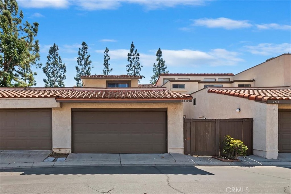 9765 Louise Way Rancho Cucamonga, CA 91730 - Photo 26 of 28 a front view of a house