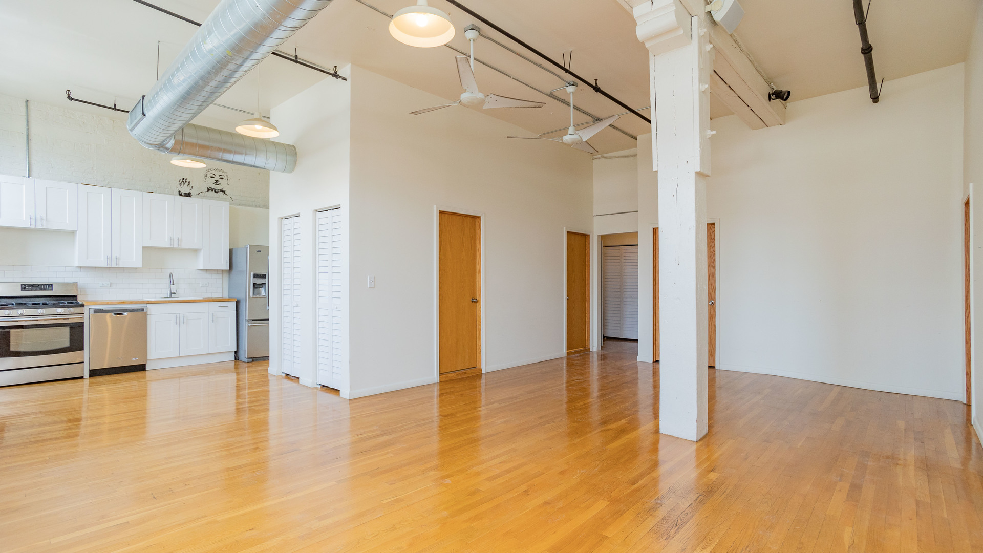159 North Racine Avenue, Unit 2W Chicago, IL 60607 - Photo 3 of 11 a view of a kitchen with a sink