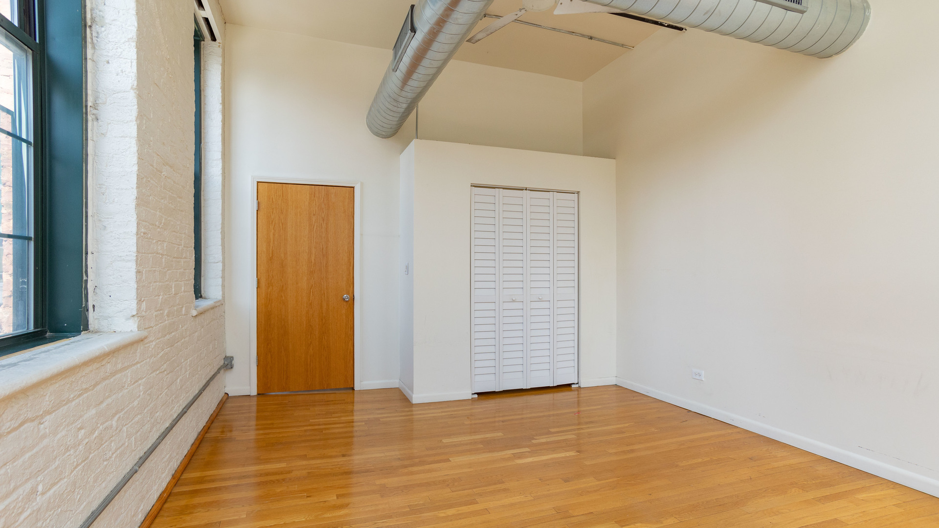159 North Racine Avenue, Unit 2W Chicago, IL 60607 - Photo 8 of 11 a view of an empty room