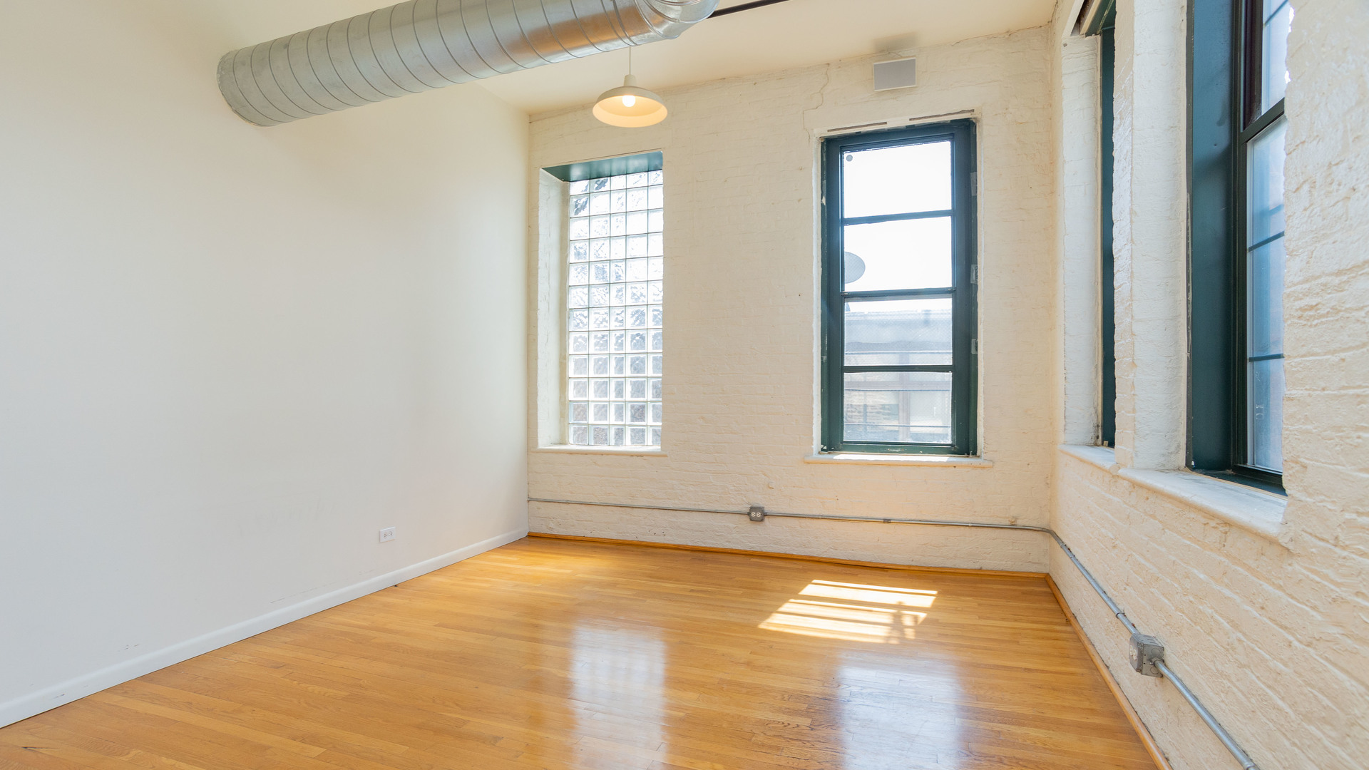 159 North Racine Avenue, Unit 2W Chicago, IL 60607 - Photo 9 of 11 a view of empty room with window