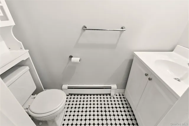 a bathroom with a sink and a toilet