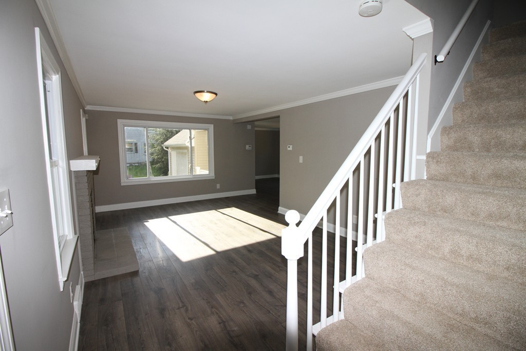 68 Mill Road East Longmeadow, MA 01028 - Photo 3 of 12 wooden floor in an empty room with a window