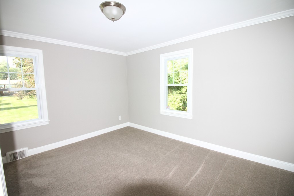 68 Mill Road East Longmeadow, MA 01028 - Photo 7 of 12 an empty room with windows