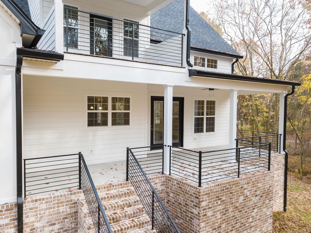 685 Wallace Road Gallatin, TN 37066 - Photo 14 of 64 a front view of a house with large windows