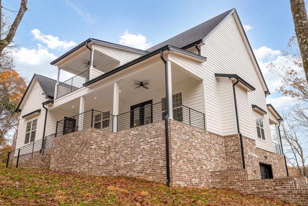 685 Wallace Road Gallatin, TN 37066 - Photo 20 of 64 a front view of a house with large windows