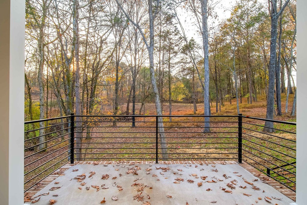 685 Wallace Road Gallatin, TN 37066 - Photo 22 of 64 a view of a yard with wooden fence
