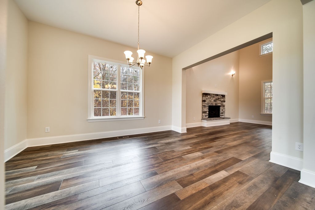 685 Wallace Road Gallatin, TN 37066 - Photo 33 of 64 a view of empty room with wooden floor and window