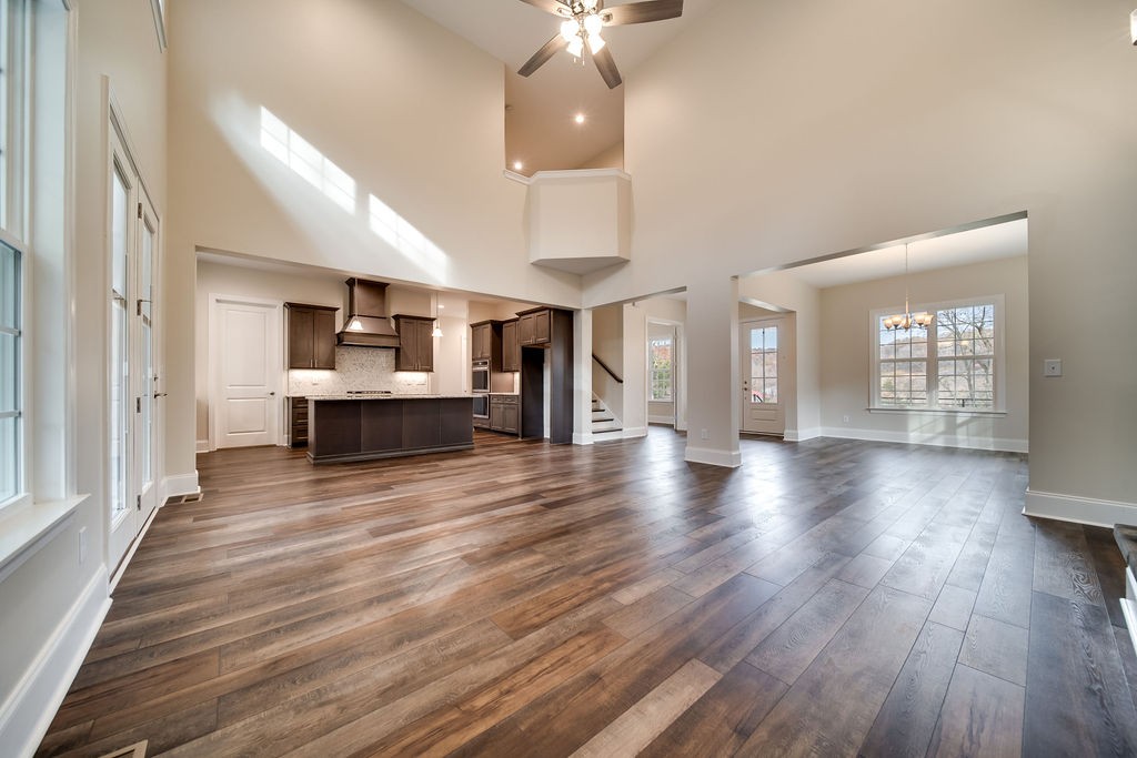 685 Wallace Road Gallatin, TN 37066 - Photo 35 of 64 a view of a living room a kitchen and a wooden floor
