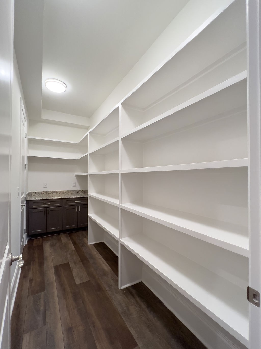 685 Wallace Road Gallatin, TN 37066 - Photo 42 of 64 a storage room with wooden floor