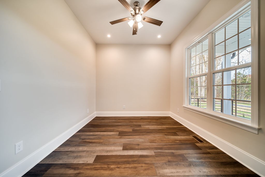 685 Wallace Road Gallatin, TN 37066 - Photo 46 of 64 wooden floor in an empty room with a window
