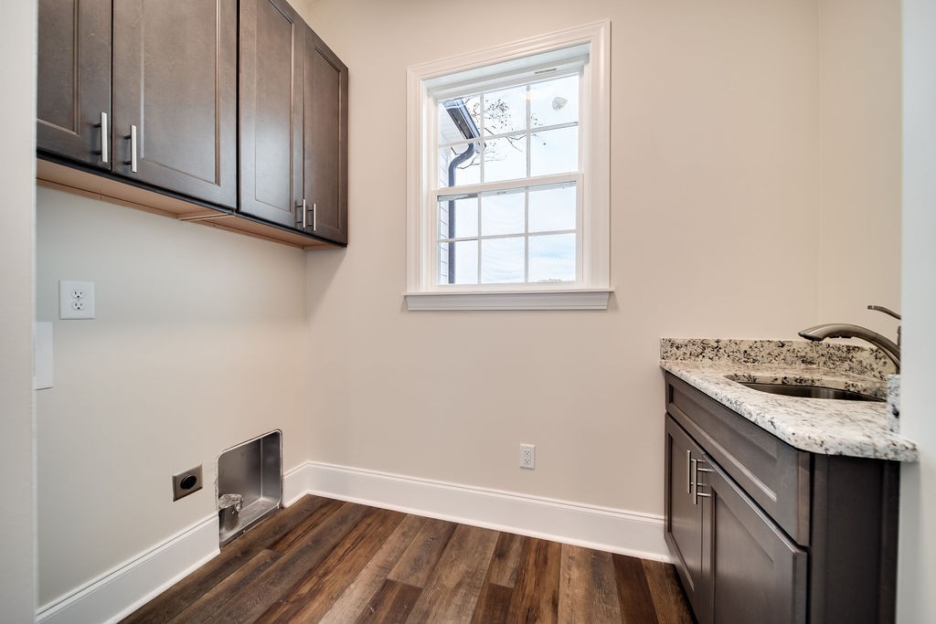685 Wallace Road Gallatin, TN 37066 - Photo 47 of 64 a bathroom with a granite countertop sink and a window