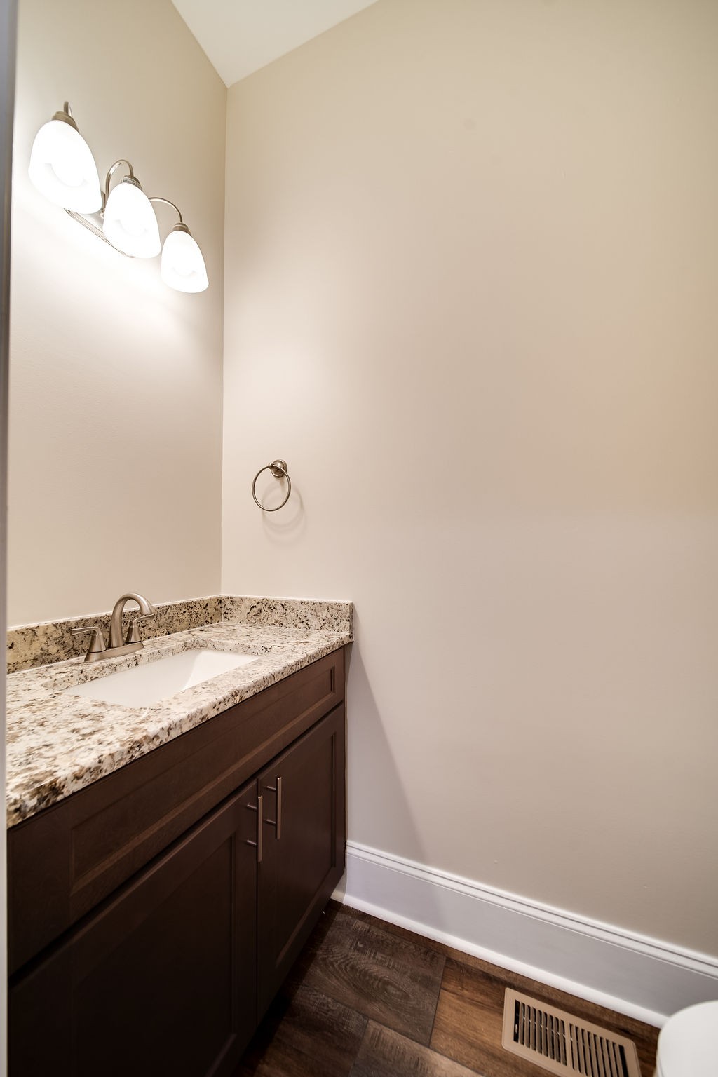 685 Wallace Road Gallatin, TN 37066 - Photo 48 of 64 a bathroom with a granite countertop sink and a mirror