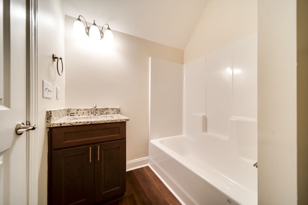 685 Wallace Road Gallatin, TN 37066 - Photo 62 of 64 a bathroom with a sink and a mirror