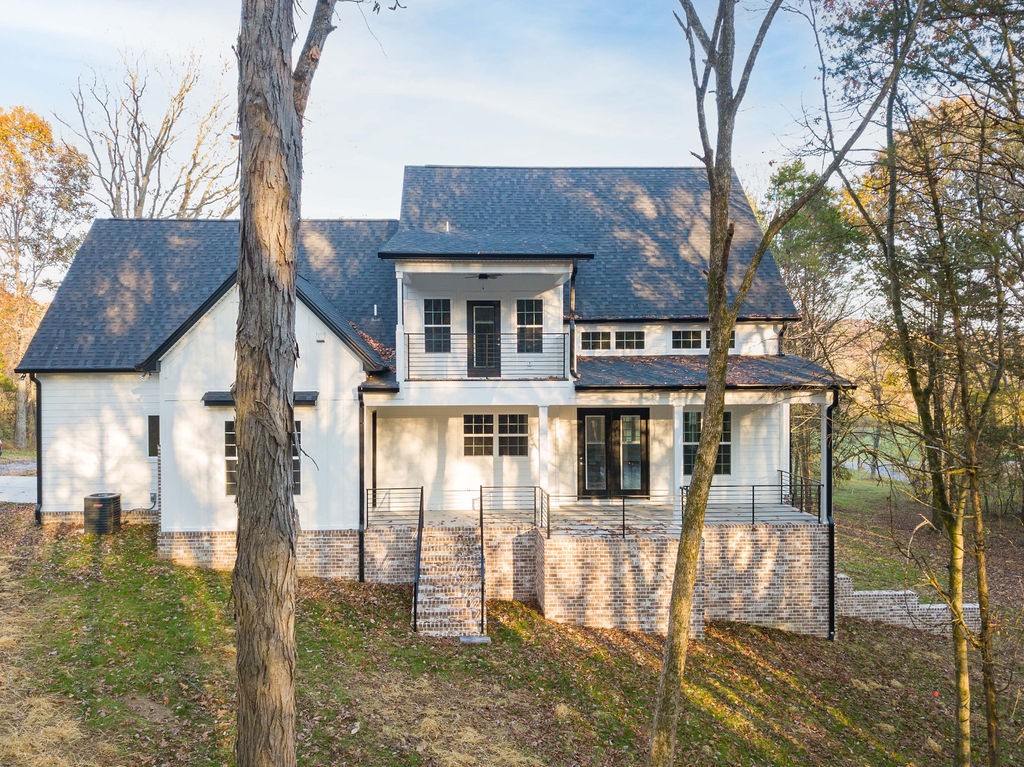 685 Wallace Road Gallatin, TN 37066 - Photo 8 of 64 Covered back porch and a balcony on the 2nd floor