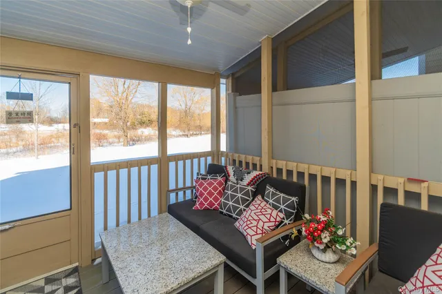 a view of balcony with lounge chair