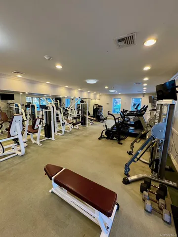 a view of a golf course with outside space